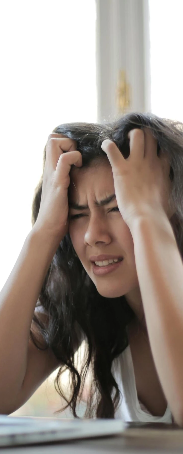 Stressed woman | Toxic workplace culture