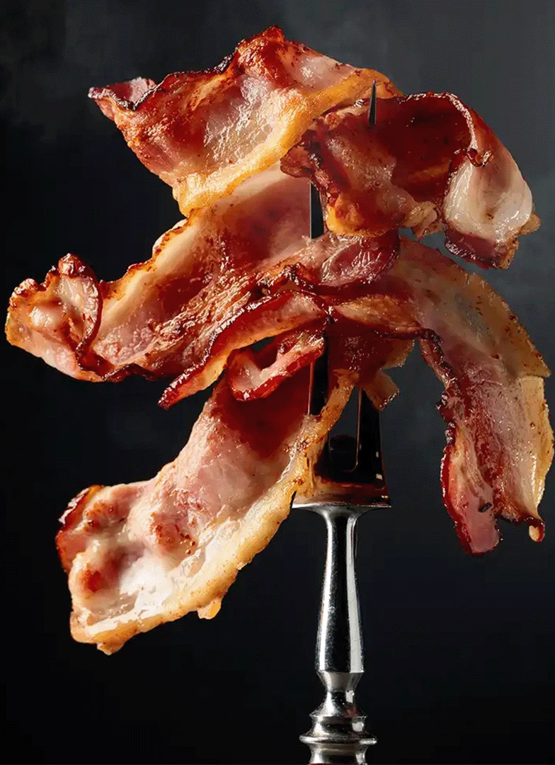 Bacon from quality foods of Aberdeen on a fork